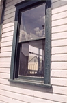 Reflections: Front bedroom window in No. 4 DancyT--The Thomas home