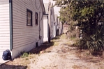 Back of east side houses land leading north to 10th.