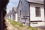 Driveway behind houses on west (