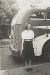 4th Grade Teacher, Joan Thomas keeps an eye on her students as they board the bus for the pretend trip