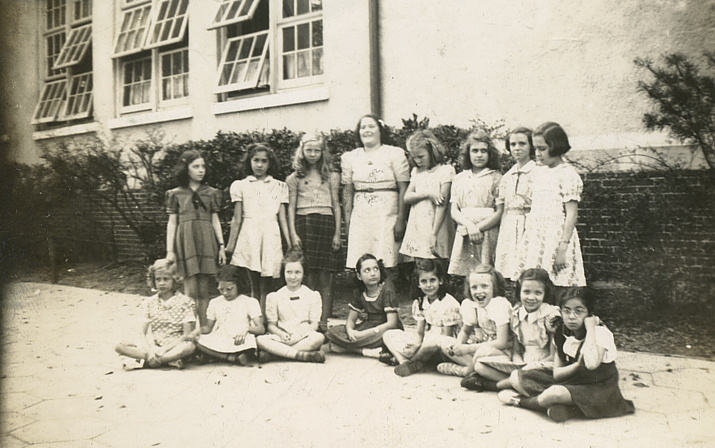 Thought to be Anneitta Morgan with Joan Thomas' students in Waltz of Flowers number in May Day 1941 pageant in front of school