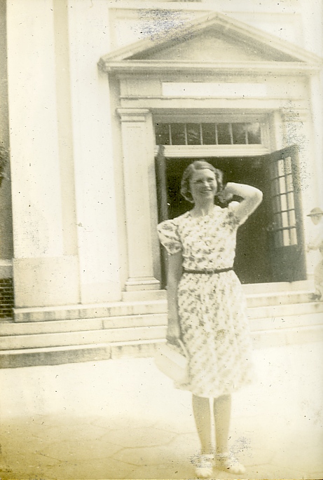 Unidentified Teacher in Front of School. The photo was taken about 193 .... 