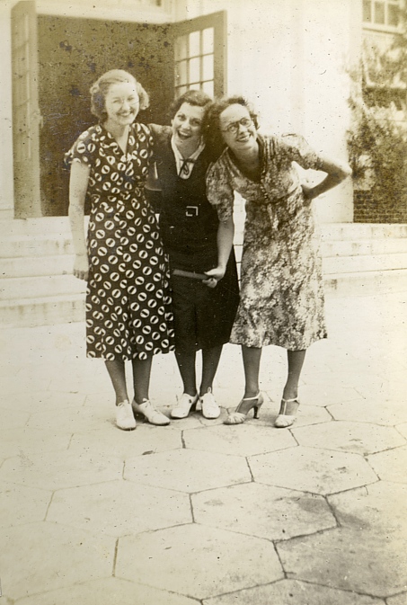 Joan Thomas (left) poses with fellow teachers in front of school (193-).
