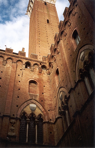 Inside the Courtyard of the Palazzo Pubblico in Siena, Looking Up at the Mangia Tower by Alexandra Agostino