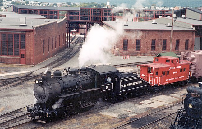Baldwin Locomotive Works No. 26 with Lehigh Valley all steel Caboose #95003 built by LVRR Shops, Sayre, PA, May 1941